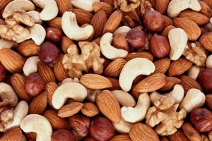 Assorted nuts (almonds, filberts, walnuts, cashews) close up